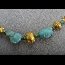 Collier de fouilles en or et turquoise